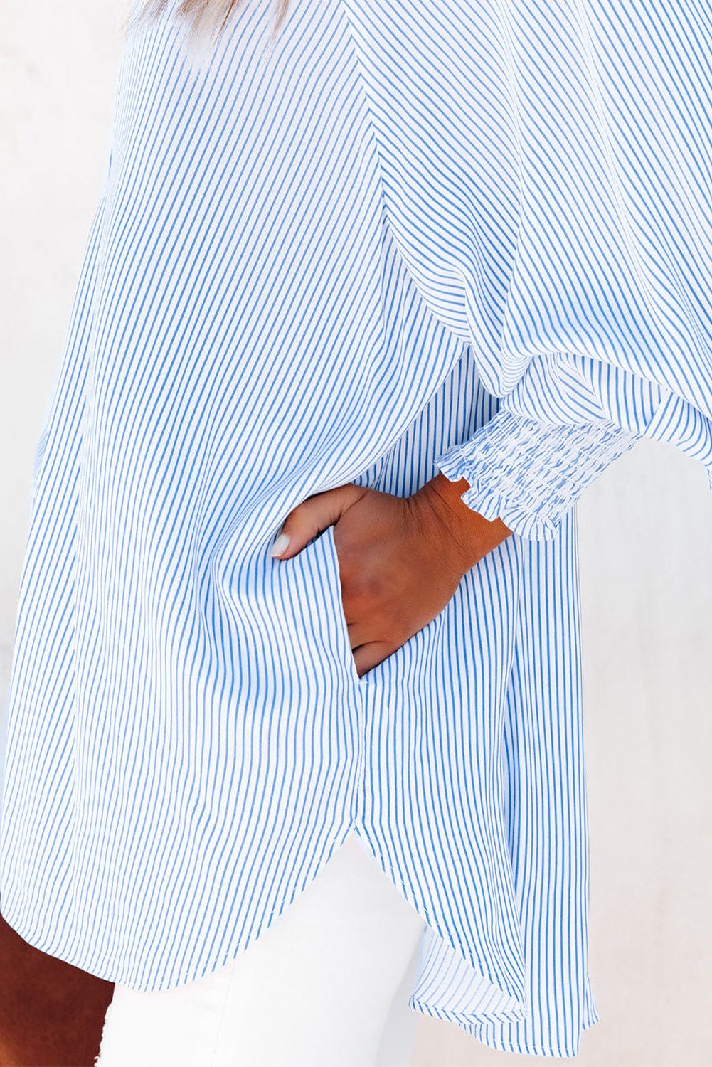 This Week's Special Price $24.99 Mid-length shirt with striped lapel and oversized drawdown sleeves